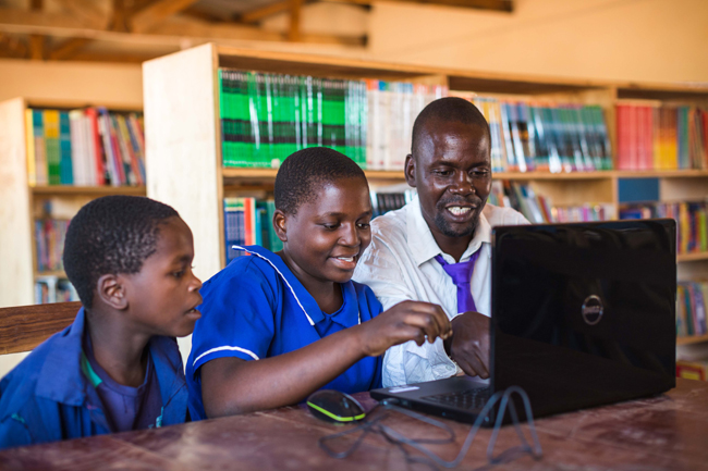 School children on a laptop