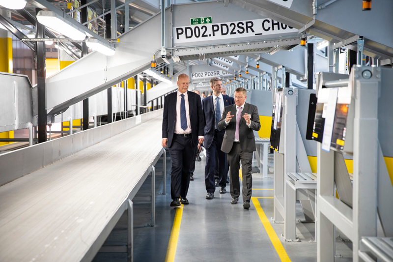 Transport Secretary Chris Grayling MP is shown the new UPS facility