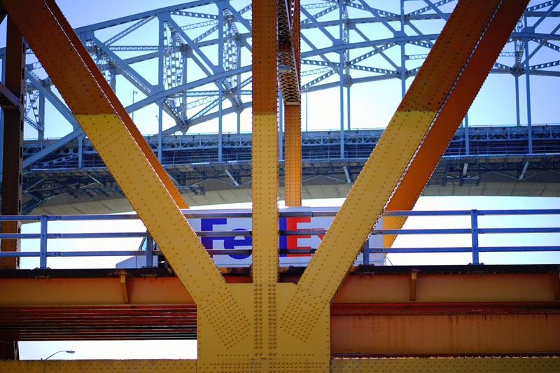 FedEx van crossing bridge